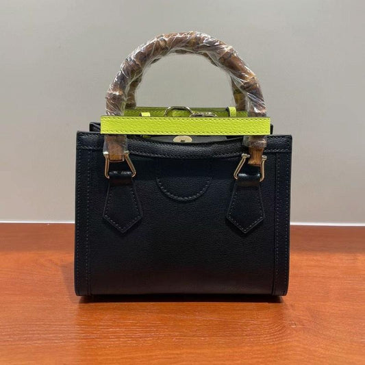 Versatile Cowhide Shoulder Bag for All Occasions - Black